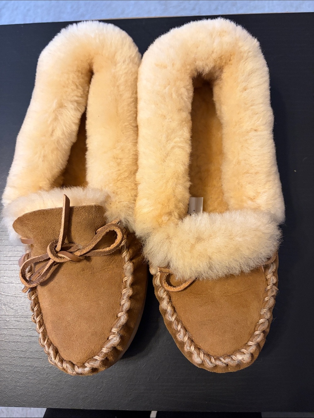 L.L. Bean Women’s Shearling-Lined Moccasin Slippers in Chestnut Brown
